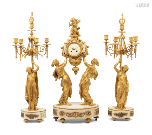 A Louis XVI Style Gilt Bronze and Marble Figural Clock Garni...