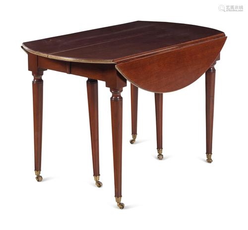 A French Brass Mounted Mahogany Drop-Leaf Dining Table