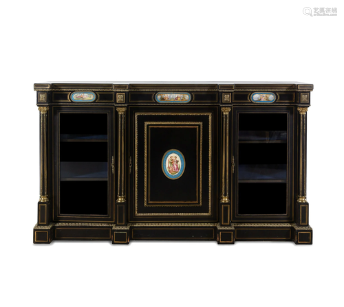 A French Ebonized, Gilt Bronze and Porcelain Mounted Console...