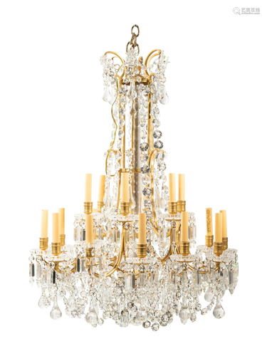 A French Gilt Bronze and Cut Glass Eighteen-Light Chandelier...