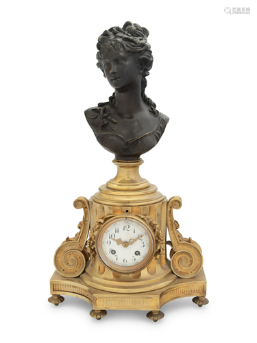 A French Gilt and Patinated Bronze Clock with a Bust of a La...