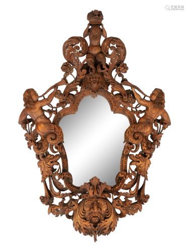 An Italian Carved Walnut Mirror in the Manner of Valentino B...