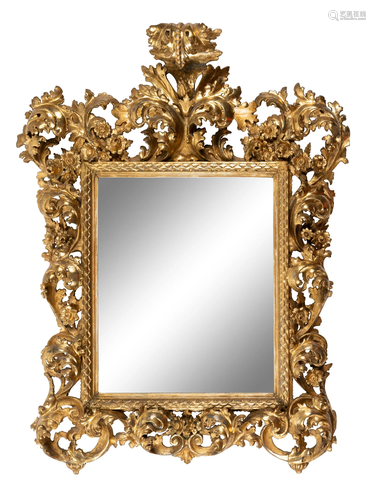 An Italian Baroque Style Giltwood Mirror