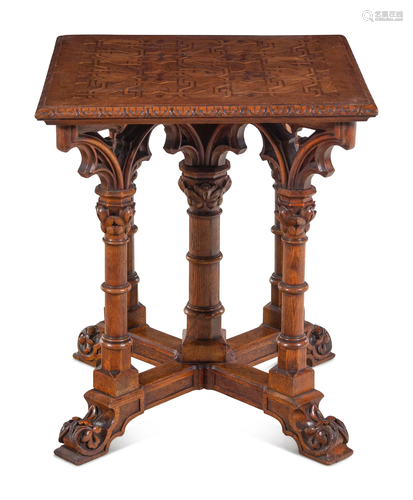 A Gothic Revival Walnut and Oak Parquetry Center Table by L....