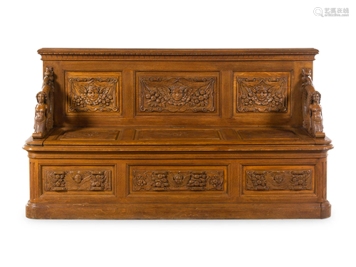 A Renaissance Revival Carved Walnut Hall Bench in the Manner...