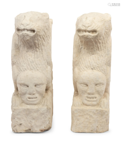A Pair of Gothic Style Carved Marble Ornaments