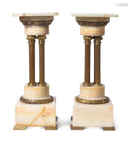 A Pair of Continental Gilt Bronze Mounted Onyx Pedestals