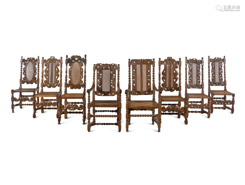 An Assembled Set of Eight English Baroque Walnut Cane-Uphols...