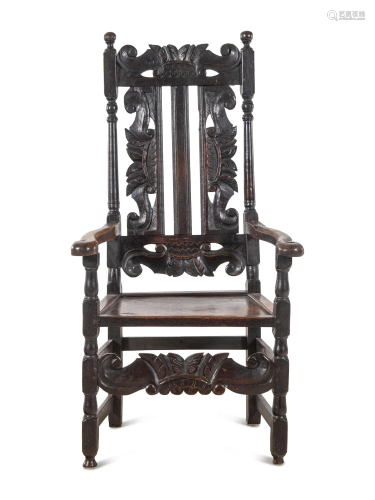 A William and Mary Carved Oak Armchair