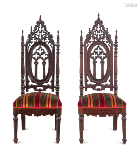 A Pair of Victorian Gothic Carved Walnut Side Chairs