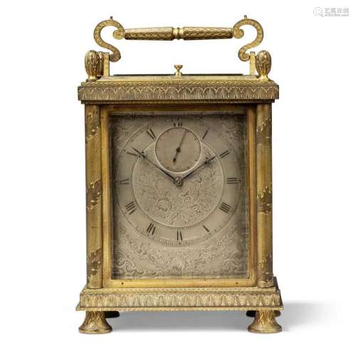A VICTORIAN GILT-BRASS ENGLISH CARRIAGE CLOCK WITH CENTRE SE...