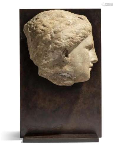 A GREEK MARBLE HEAD OF A WOMAN