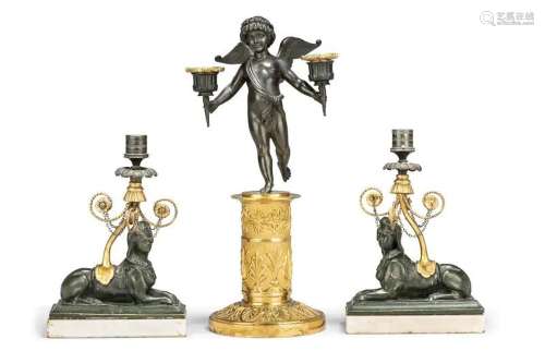 A PAIR OF REGENCY ORMOLU AND PATINATED-BRONZE-MOUNTED BRONZE...