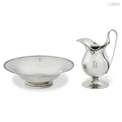 A SPANISH SILVER EWER AND A BASIN