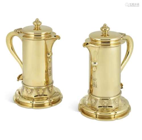 TWO GEORGE IV SILVER-GILT FLAGONS
