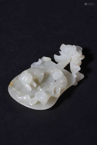 Carved White Jade Boy and Lion Ornament