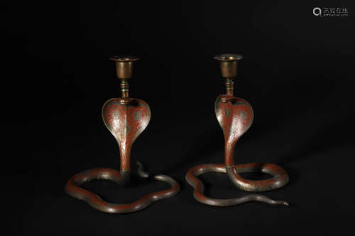 Pair of Bronze Snake Candlesticks