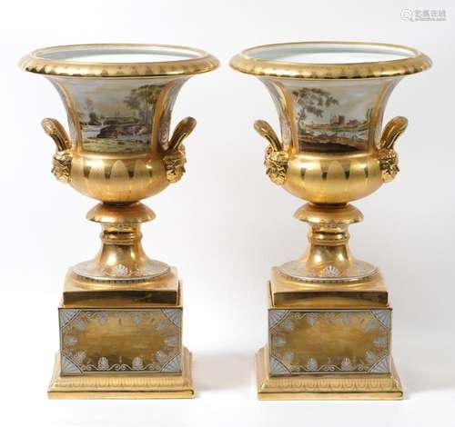 Pair of enameled and gilded porcelain cups in the Empire sty...