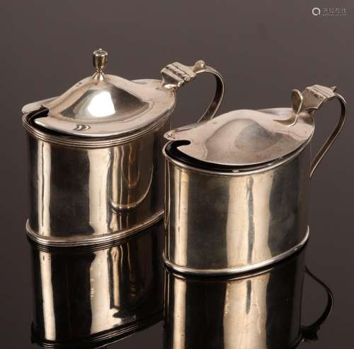An oval silver mustard pot with hinged cover, Birmingham 190...