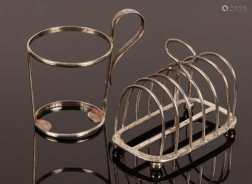 A Victorian silver seven-bar toast rack, London 1886 and a s...