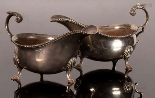 A pair of 18th Century style silver sauce boats, GH, Sheffie...