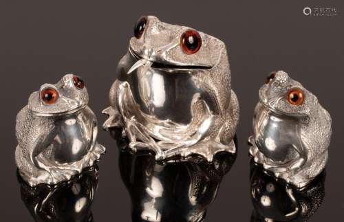 A novelty three-piece silver cruet of toad form, Richard Com...