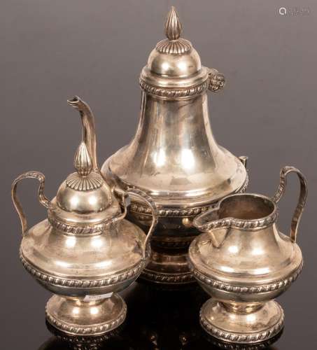 An Egyptian silver four-piece tea and coffee set, comprising...