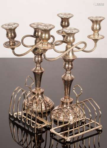 A pair of Sheffield plate two-branch, three-light candelabra...