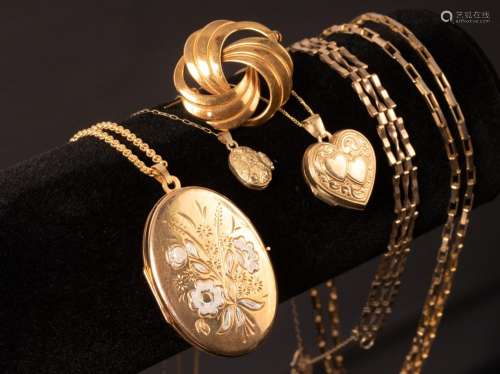 Three 9ct gold lockets on fine link 9ct gold chains, a 9ct g...