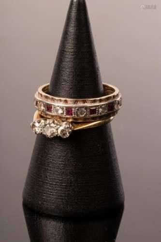 A diamond three-stone ring, set in 18ct gold and platinum,