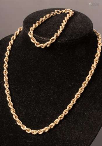 An Italian 9k yellow gold ropetwist necklace and closely mat...