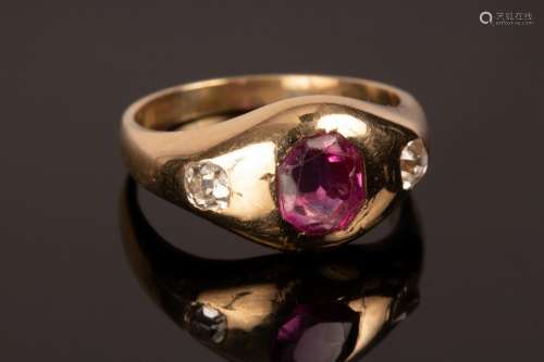 A ruby and diamond three-stone ring, set in 18ct yellow gold...