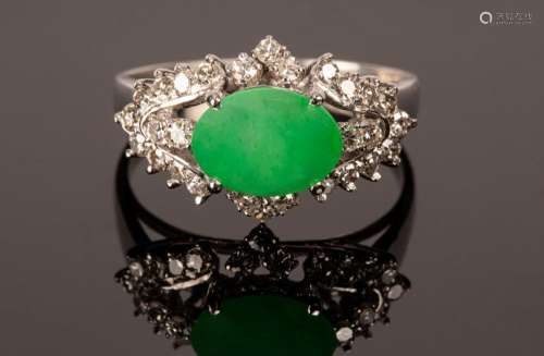 A jade and diamond dress ring, set in 18k white gold, the ov...