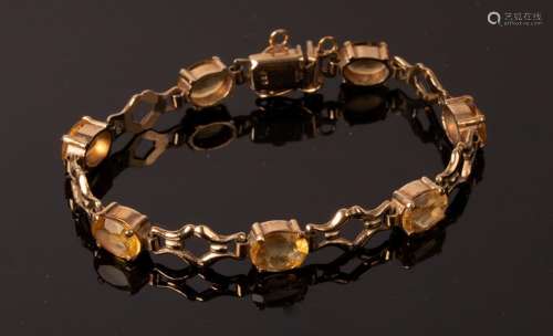 A gem set bracelet by Cropp & Farr, set in 9ct gold,