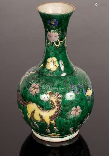 A Kangxi style famille verte vase, decorated green and black...