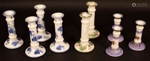 Poole Pottery, six assorted candlesticks,