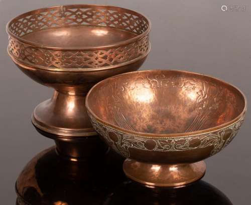 A copper pedestal bowl with pierced border,