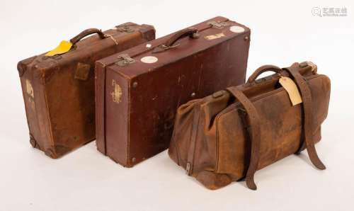 A quantity of luggage to include two leather cases and a Gla...
