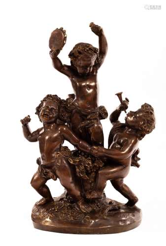 A large French bronze Bacchus group of three putti, the cent...