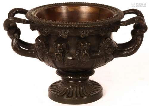 A late 19th Century bronze model of the Warwick vase, twin w...