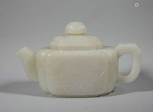 Qing Dynasty flower pattern and tian white jade teapot