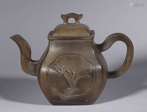 Carved square orchid teapots from the Qing Dynasty