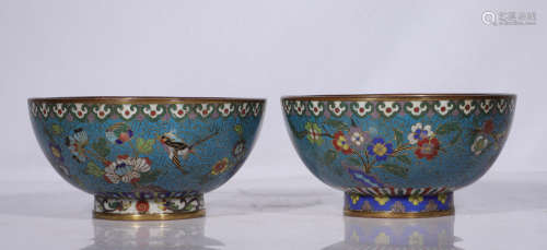 A pair of cloisonne bowls with floral patterns from the Qing...
