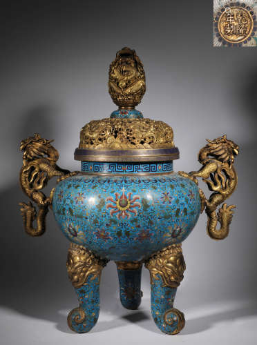 A Cloisonne three-legged incense burner from the Qing Dynast...
