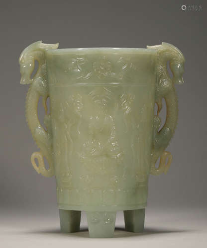 Hetian jade three-legged double-dragon ear cup from the Qing...