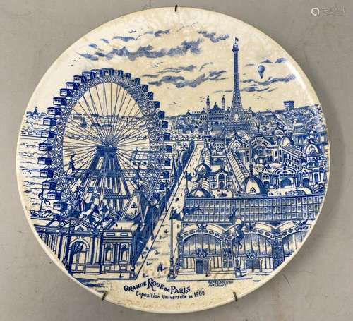 Plat en faïence en camaieu de bleus figurant la Grande Roue ...