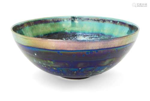 Sutton Taylor, b.1943, a green and blue thrown earthenware b...