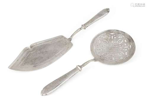 A pair of fish servers, white metal (unmarked), both chased ...
