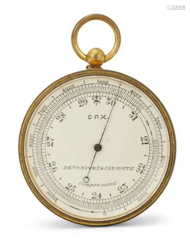 A brass cased compensated aneroid pocket barometer with comp...