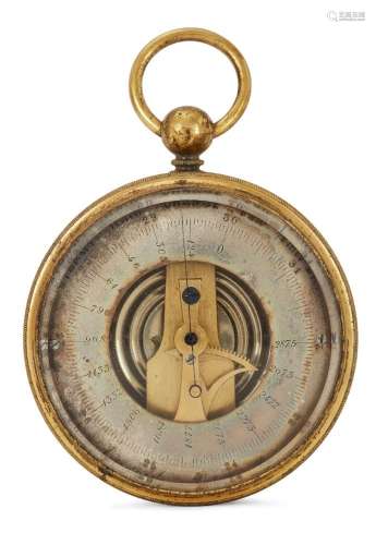 An English brass pocket aneroid barometer, late 19th century...